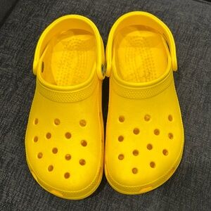 Like new yellow crocs, size 6, men 8 women